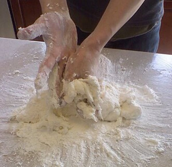Kneading pizza messy