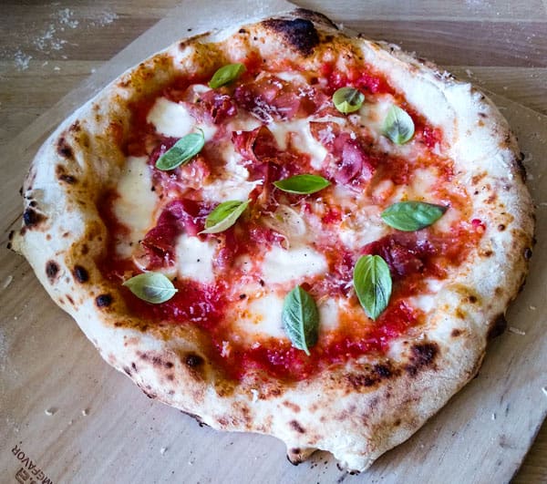Adding parmesan after the pizza is cooked is a great tip