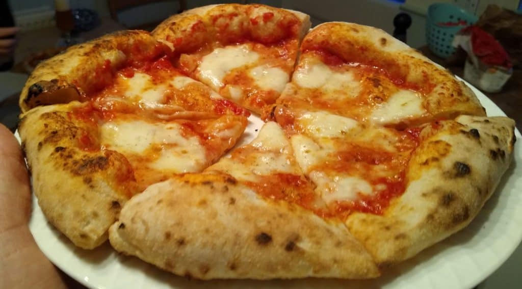 Kneading pizza dough by hand