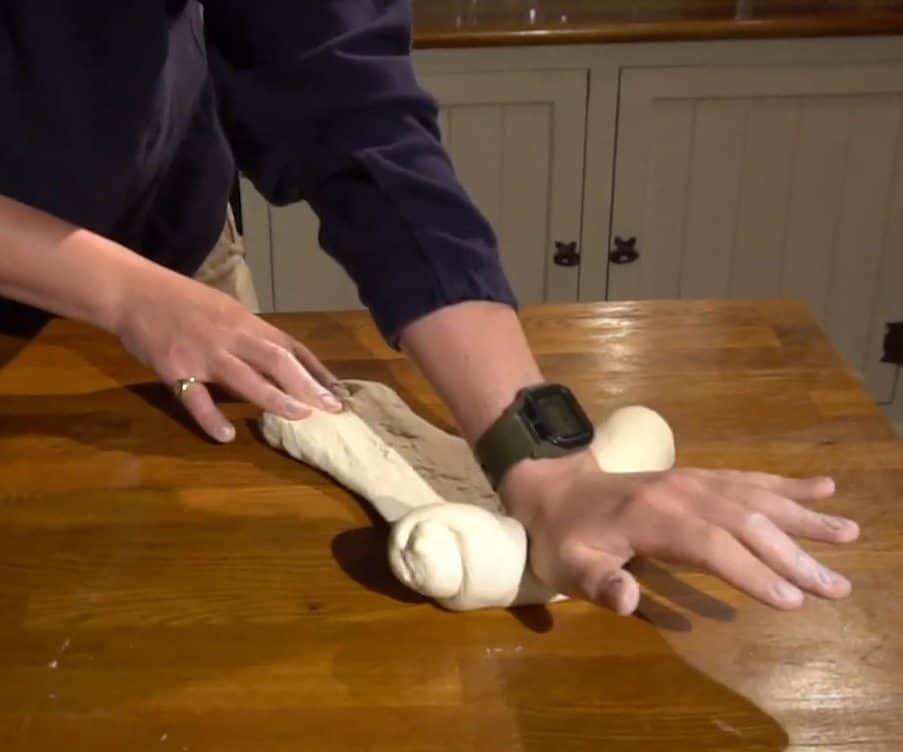 Kneading pizza dough by hand