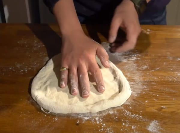 Neapolitan pizza slapping technique