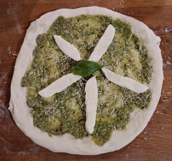 Pesto and mozzarella pizza
