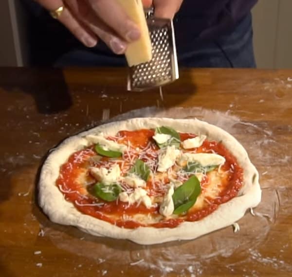 Preparing pizza toppings