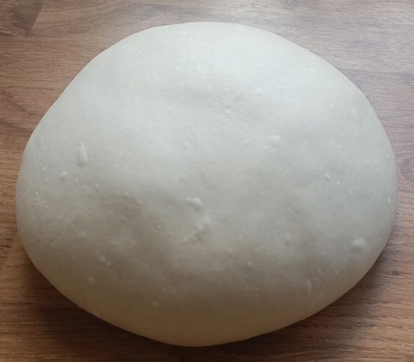 Making dough for a pizza oven