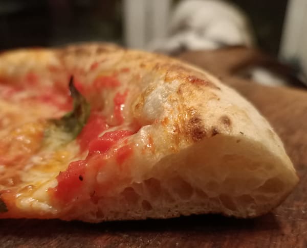 Should you knock back pizza dough?