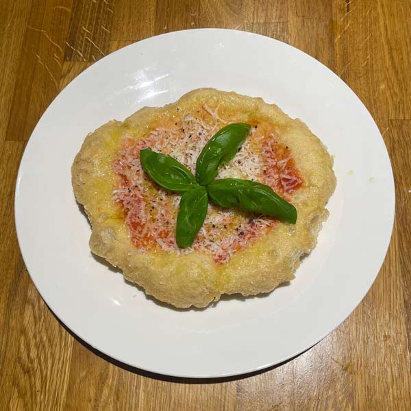 Fried pizza with parmesan